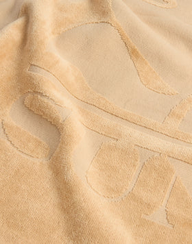 TISSU ÉPONGE JACQUARD AVEC LOGO ET BORDURE
