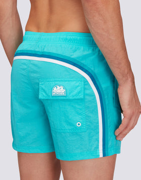 SHORT CRINKLED SWIM SHORTS WITH AN ELASTICATED WAISTBAND