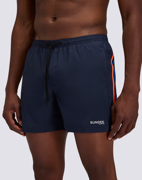 BAÑADOR CON TEJIDO ELÁSTICO, CINTURA ELÁSTICA Y BOLSILLO EXTRAÍBLE