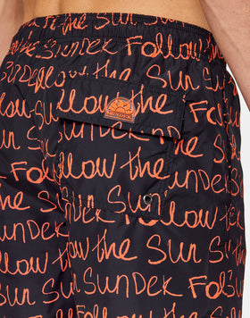 LONG SWIM SHORTS WITH AN ELASTICATED WAISTBAND FOLLOW THE SUN PRINT