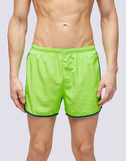 SHORT SWIMSHORTS WITH ELASTIC WAIST AND ROUND SIDE SLITS
