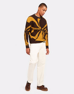 JERSEY DE CUELLO REDONDO CON BORDADO DE FLOR